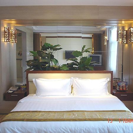 New Beacon Xinhang International Hotel Wuhan Værelse billede