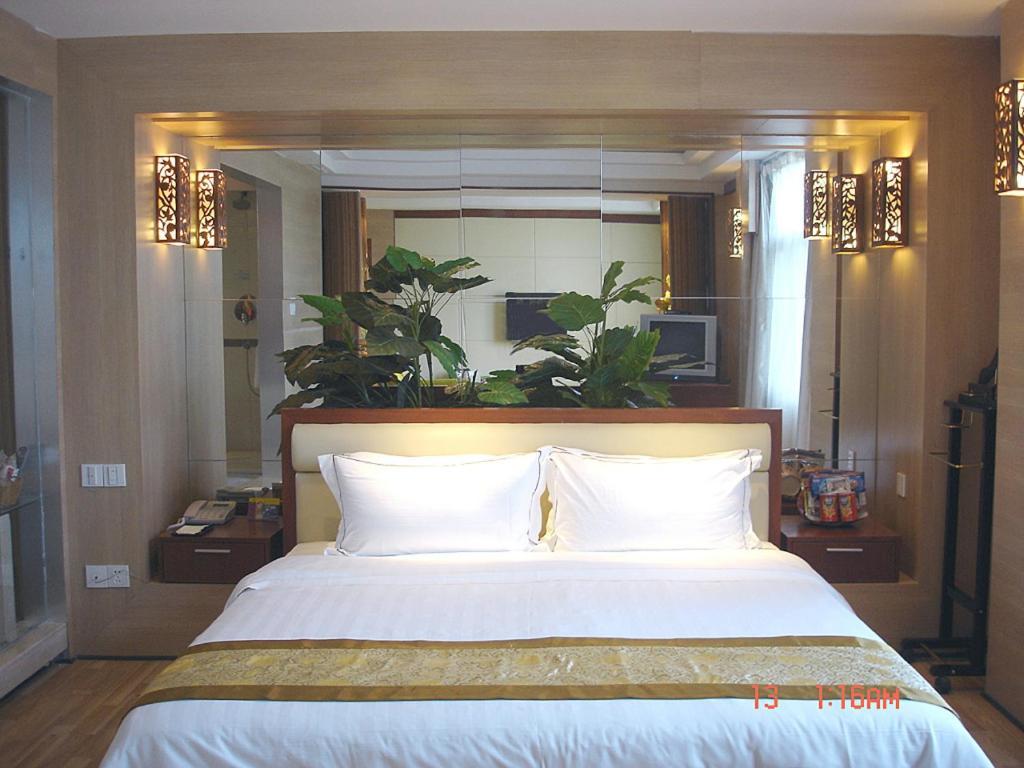 New Beacon Xinhang International Hotel Wuhan Værelse billede